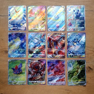 handmade pokemon tcg pocket proxy jirachi, riolu, lucario, mega lucario, vaporeon, treecko, zorua, zoroark, flygon, sobble, gen 1 pokemon starters, victini, eevee, eeveelutions, custom cards charizard, blastoise, squirtle, charmander, bulbasaur, venusaur, legendary, mythical, proxies mythical island, eevee grove, genetic apex, celestial guardians, extradimensional crisis, paradox drive, pulsing aura, mega shine, paldean wonders, fantastical parade, crimson blaze, mega rising, deluxe pack ex
