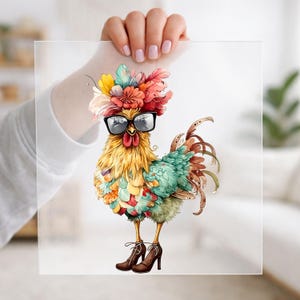 May include: A square print featuring a colorful rooster wearing black-rimmed glasses, a vibrant floral headpiece with yellow, orange, and pink petals, and brown high-heeled shoes. The rooster has yellow, teal, and orange feathers on its body.