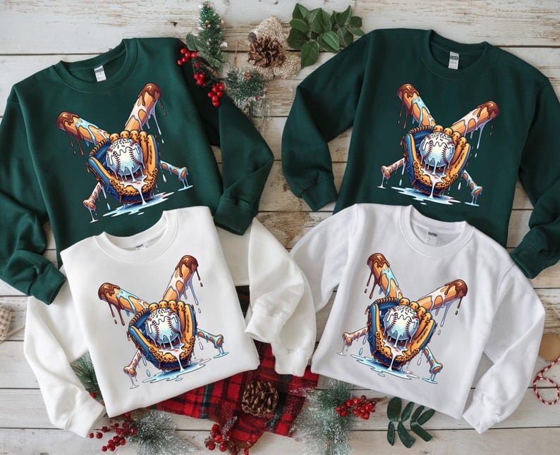 May include: Four crewneck sweatshirts, two in dark green and two in white. Each sweatshirt features a baseball design with a baseball, bat, and glove with dripping details. The design is in shades of blue, brown, and white.