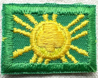 Vintage 1980s Girl Scout Junior “Sign of the Sun” - Junior Uniform Insignia - Plastic backing