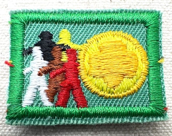 Vintage 1980s Girl Scout Junior “Sign of the World” - Junior Uniform Insignia - Plastic backing