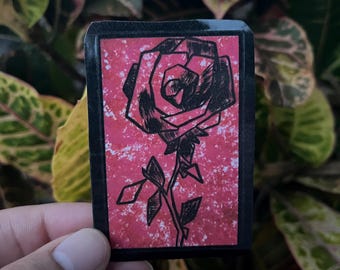 Rosa geométrica: pegatina floral moderna