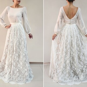 Lace wedding skirt in A-line silhouette made in delicate Chantilly lace over tulle and satin under layers.