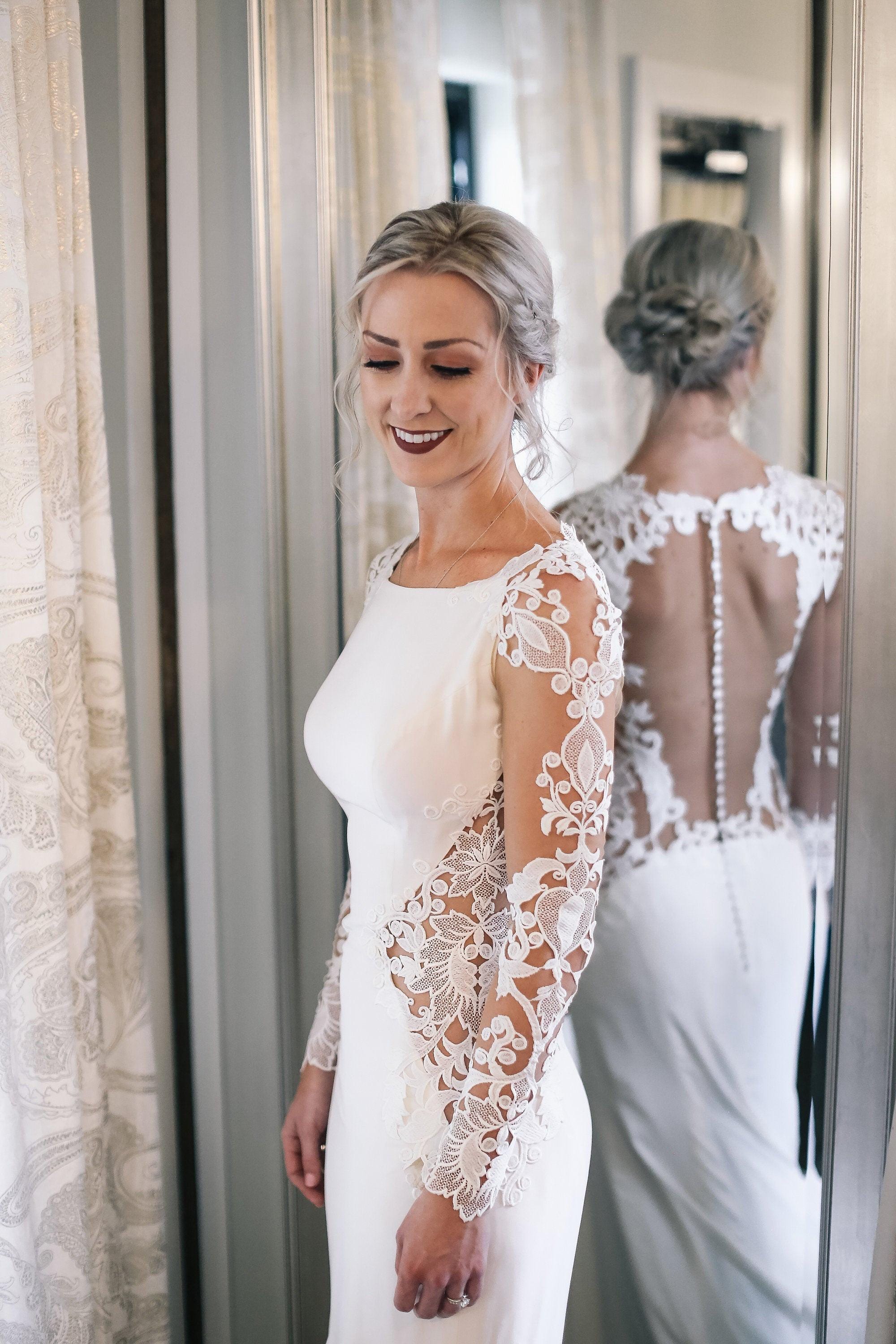 long sleeve trumpet wedding dress chinese ladies Ivory Cape Lace Mermaid Dress with Appliques Ideal for the bride who desires sophistication with a hint of sensuality Jovani Bridal - JB02579 Embellished
