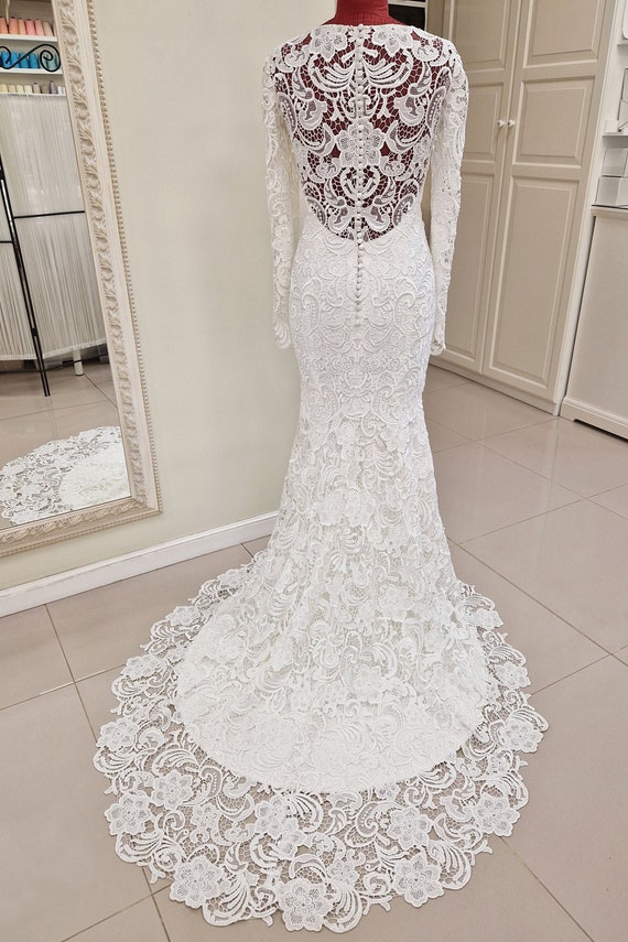 sachin and babi light blue dress Winter brides, we've got you coveredliterally! If you're dreaming of a wedding  dress with sleeves, consider #Style15159 by @PninaTornai!  This  embroidered lace ballgown features a beautiful basque waist, long  off-the-shoulder applique