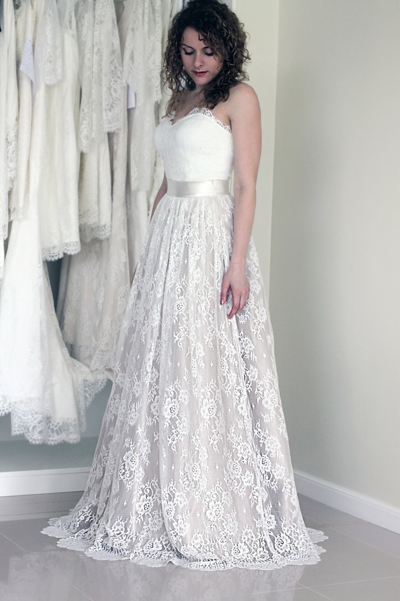 Wedding lace skirt in A-line silhouette made in delicate Chantilly lace over tulle and satin under layers.