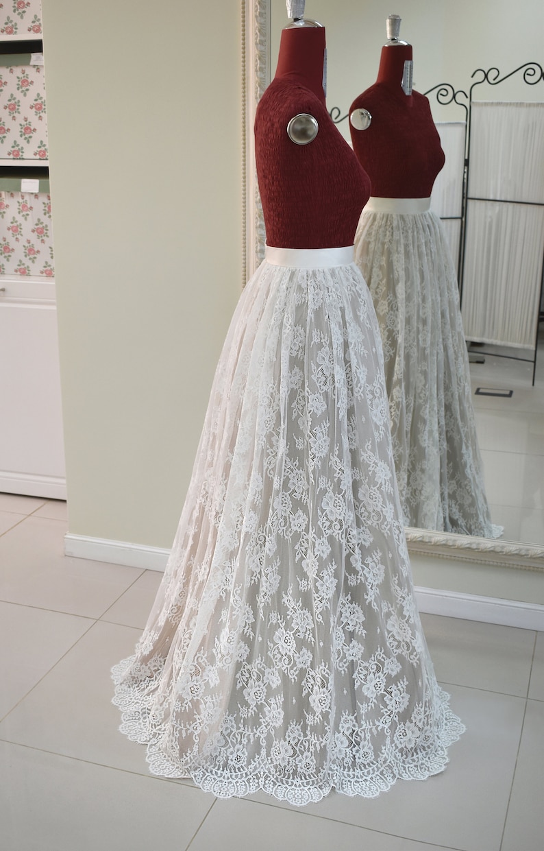 Wedding lace skirt in A-line silhouette made in delicate Chantilly lace over tulle and satin under layers.