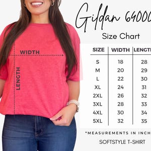 May include: A Gildan 64000 Softstyle t-shirt size chart featuring a pink t-shirt with width and length measurement lines. The chart lists sizes S through 5XL with corresponding width and length measurements in inches, ranging from 18 to 35 inches.