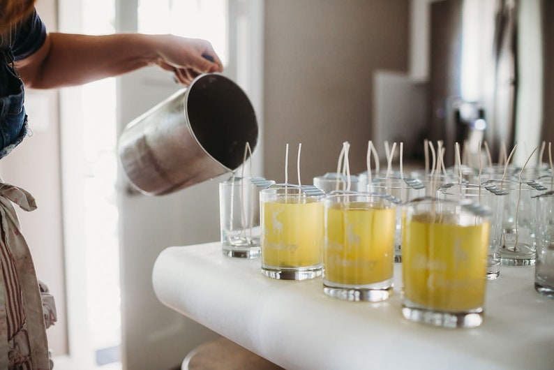 Pouring wax into glass jars for the French Collection Home Scents - Hicks Chandlery. #candlemaking #candles #handmade