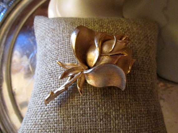 trifari rose brooch