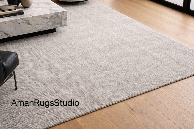 Transform your living space with the timeless elegance and unmatched comfort of our Hand Tufted New Zealand Wool Rug, thoughtfully designed to bring luxury, warmth, and modern sophistication into your home. This premium wool rug is a perfect blend of minimalist design, natural materials, and artisan craftsmanship, making it an ideal choice for modern, contemporary, and luxury interiors