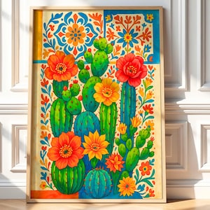 May include: A framed art print with a colourful illustration of cacti and flowers. The artwork depicts various cacti in green and blue hues, decorated with bright orange, yellow, and red flowers. The background has a decorative floral pattern.