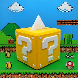 Könnte beinhalten: Ein Set aus drei Keramikbechern mit gesprenkelter, matter Oberfläche. Die Becher sind in Creme-, Hellgrau- und Dunkelgrautönen gehalten. Jeder Becher hat ein schlichtes, minimalistisches Design und einen abgerundeten Henkel.