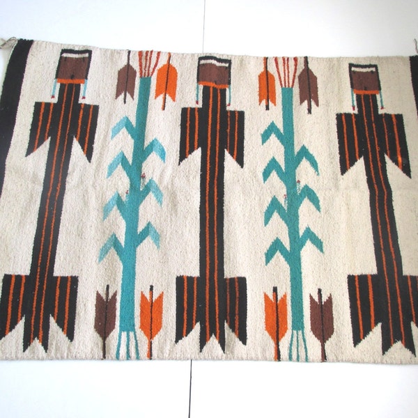 Vintage woven rug/ Navajo Yei figural/ orange and blue/ arrows/ wall hanging