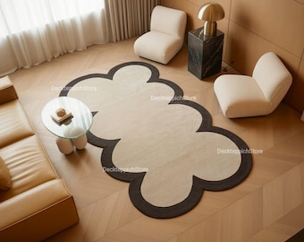 Alfombra de lana festoneada tejida a mano con bordes festoneados en beige y negro