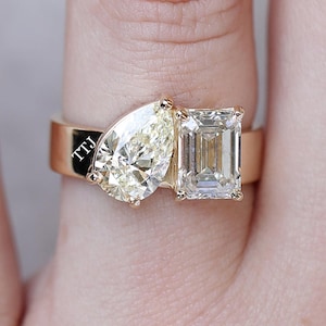 Toi et Moi Pear and Emerald Cut Moissanite Diamond Ring Two Stone Engagement Ring 14K Yellow Gold Band Unique Bypass Style Wedding Ring