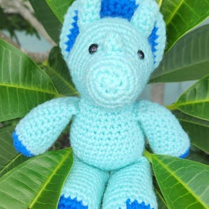 Handmade Crochet Triceratops Plushie – Cute Dino Toy in Blue and Aqua