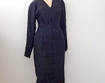 1980s Pauline Trigere Cocktail Dress / black silk wiggle dress / designer vintage LBD