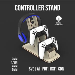 May include: A wooden controller stand with two white and black game controllers and a black and blue headset. The stand has the text "CONTROLLER STAND" and "DIGITAL DOWNLOAD". The stand is made of wood and has the following measurements: 3MM, 1/8IN, 4MM, and 5MM.