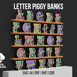 May include: A display of colorful letter piggy banks, each with a name, arranged on wooden shelves. The text "LETTER PIGGY BANKS" is at the top. The image includes a digital download icon and file type options: SVG, AI, PDF, DXF, and CDR.