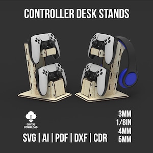 May include: Wooden controller desk stands in a light wood finish, holding white and black game controllers and a black and blue headset. The text "CONTROLLER DESK STANDS" is at the top. The image also includes the text "DIGITAL DOWNLOAD" and file format options.