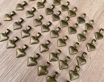 Destash lot of 40 bronze heart bails pendant backings supplies