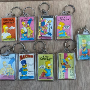 Large lot of vintage Simpsons keychains
