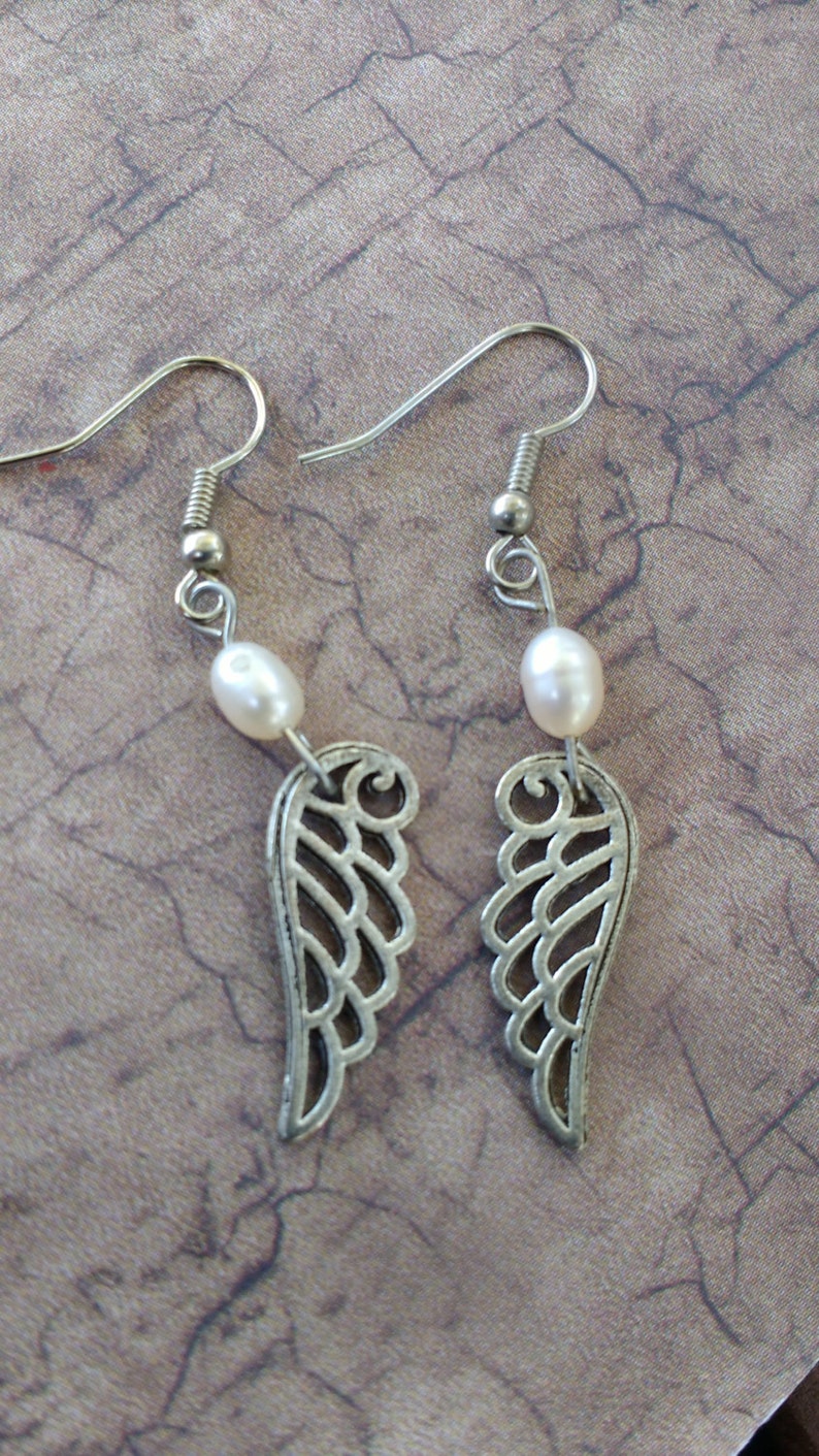 Silver tone wings earrings bird pearl beads image 1