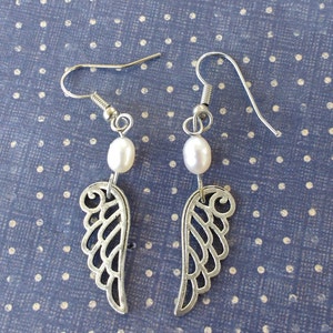 Silver tone wings earrings bird pearl beads image 2