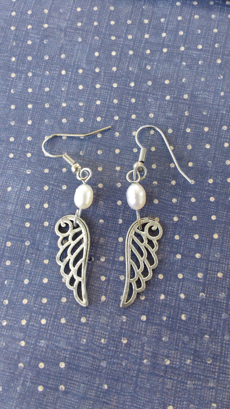 Silver tone wings earrings bird pearl beads image 2