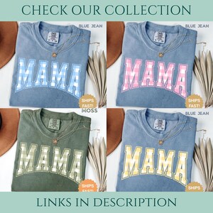 May include: Four t-shirts with the word "MAMA" in a plaid design. The shirts are in blue, pink, green, and yellow. The text "CHECK OUR COLLECTION" and "LINKS IN DESCRIPTION" are at the top and bottom of the image.