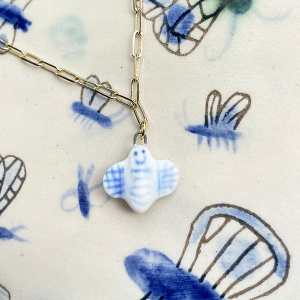 Butterfly. Insect. Beautiful creature. Porcelain charm. Satin finish. Cute, delicate insect charm