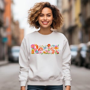 Women&#39;s Floral Resist Sweater | Feminist Sweater | Protest Graphic Sweatshirt | Cute Political Sweater | Activist Crewneck | Vote Sweatshirt