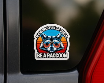 In a World Full of Trash Be a Raccoon Sticker – Funny Vinyl Raccoon Sticker for Water Bottles, Laptops, Cars, Coolers, or Journals