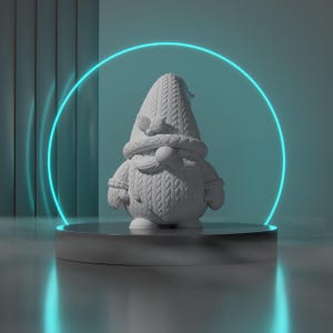 May include: A white gnome figurine with a knitted hat and sweater, a round nose, and mittens. The gnome is on a silver platform, surrounded by a blue neon circle, with a light blue background.