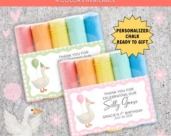 May include: Two sets of four cylindrical chalk sticks in pink, orange, yellow, and blue, wrapped in clear plastic. Each set features a label with a goose illustration, a balloon, and the text: Thank you for celebrating our Silly Goose Gracie's 1st Birthday July 29, 2025. A yellow starburst graphic reads: Personalized chalk ready to gift.