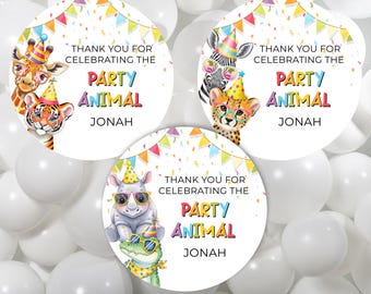 May include: Three round stickers with animal illustrations and the text "THANK YOU FOR CELEBRATING THE PARTY ANIMAL JONAH". The stickers feature a giraffe, tiger, zebra, cheetah, rhino, and alligator.