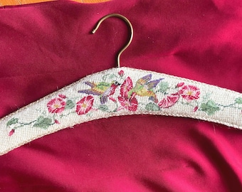vintage handmade needlepoint padded coat hanger featuring a floral and bird design
