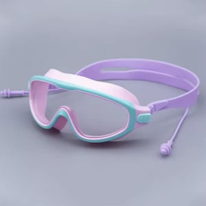 May include: Pink and teal swimming goggles with a lavender strap and earplugs. The goggles have a clear lens and are designed for water activities. The frame is a combination of pink and teal, with a lavender strap for a secure fit.