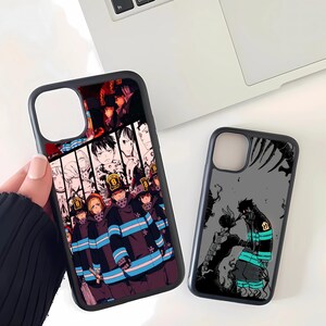 May include: Two black phone cases with anime-style graphics. One case features a group of characters in dark uniforms with blue stripes and the number 8 on their hats. The other case has a black and gray illustration of a character with a number 1.