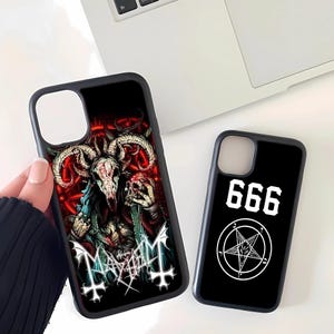 May include: Two black phone cases. One case features a detailed illustration of a horned skull with the word "Mayhem" and a cross design. The other case has the number "666" above a pentagram symbol.