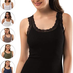 May include: Black tank top featuring lace detailing around the neckline. The image also displays four other tank tops in white, brown, olive green, and navy blue. The tank tops have a ribbed texture and appear to be made of a soft fabric.