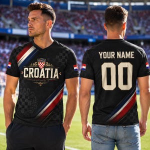 A man wearing a black and red Croatia soccer jersey with the word "Croatia" and the number "00" on the back.