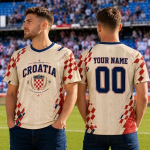 A man wearing a Croatia national team jersey with the name "Cristiano" and the number "00" on the back.