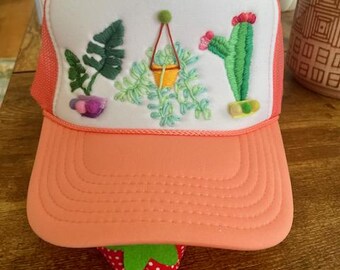 get ahold of this adorable hand embroidered trucker hat!