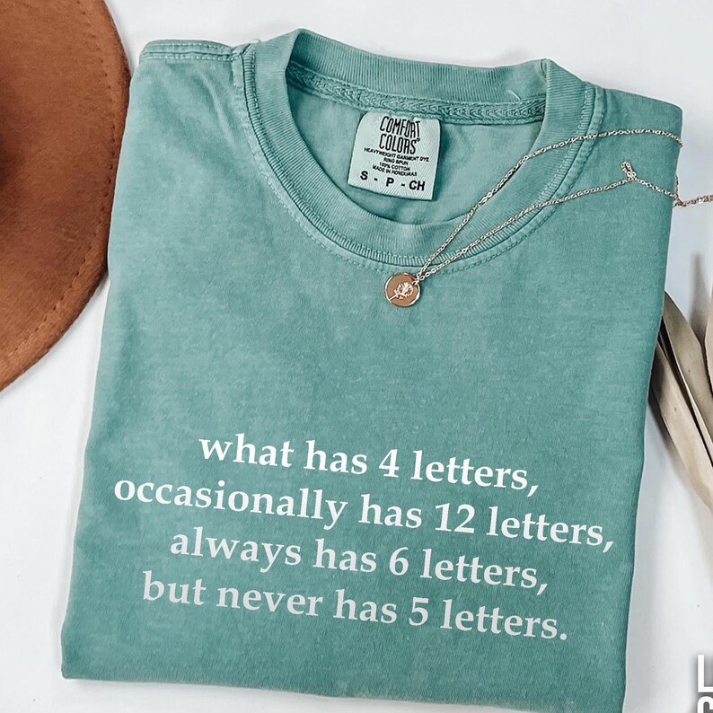 Funny Riddle Shirt, What Has 4 Letters Occasional Always but Never T ...