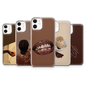 May include: A collection of phone cases with various designs. One case features a brown lip design with gold teeth. Other cases display illustrations of a person, a drink, and sunglasses. The cases have a clear border.