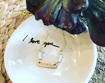 Familia en oro y perlas de agua dulce