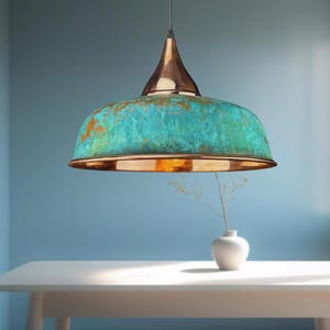 oxidized copper pendant light, green patina dome light, handmade copper lamp, rustic ceiling fixture, industrial kitchen lighting, artisan copper hanging light, vintage patina light, green dome pendant, moroccan ceiling light, hammered copper light fixture, farmhouse lighting, modern rustic pendant, kitchen island light fixture, custom handmade lighting, boho style pendant lamp, unique statement light, patina copper decor, handcrafted green light fixture, eco chic lighting, artisan dome pendant