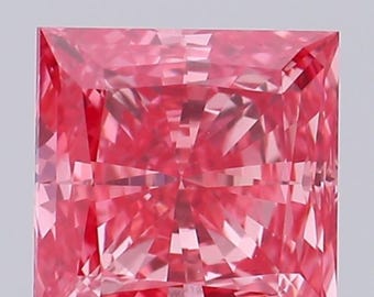 May include: A square-shaped, radiant-cut pink diamond. The gemstone's surface is intricately faceted, reflecting light to create a brilliant display of colour. The pink hue varies in intensity, with a high degree of clarity.